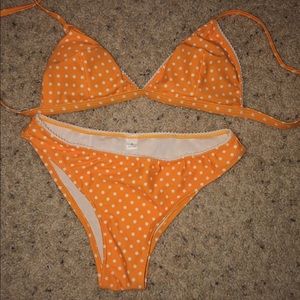 yellow/orange polka dot bikini.